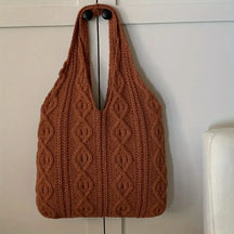 bolsa marrom de tricô com alça anatômica