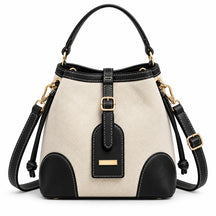 Bolsa Tote feminina em canvas preto com detalhes contrastantes