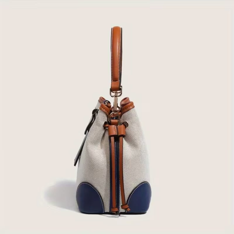 bolsa transversal feminina em lona azul com alça ajustável