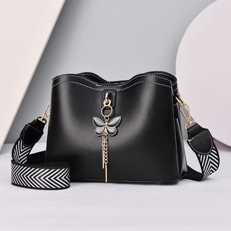 bolsa transversal feminina com borboleta preta