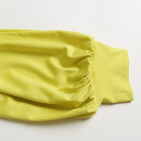 macacao feminino longo gola alta amarelo detalhes da manga