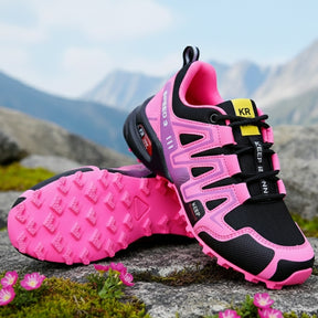 Tênis adventure unissex rosa com design esportivo em vista frontal.