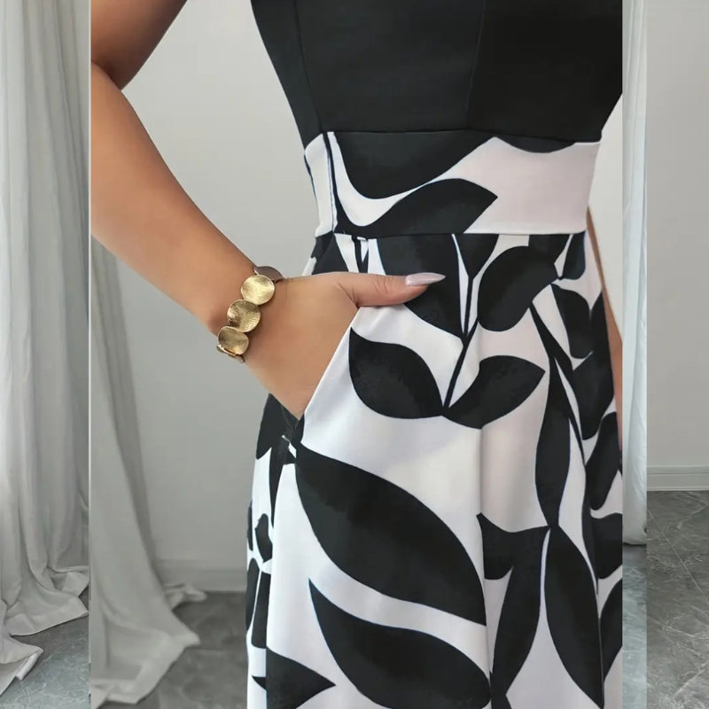 Detalhe do bolso lateral do vestido longo feminino estampado.