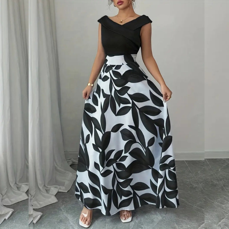 modelo mostrando vestido-longo-feminino-floral frente preto e banco 